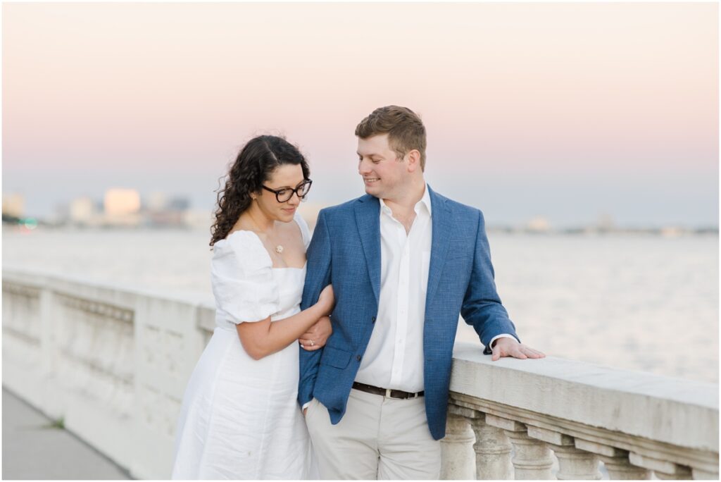 South Tampa Portrait Photographer. Bayshore Boulevard. Tampa Engagement Photography. White dress engagement outfit inspiration. Khaki Pants blue sports coat men outfit inspiration. engagement session with dog. 