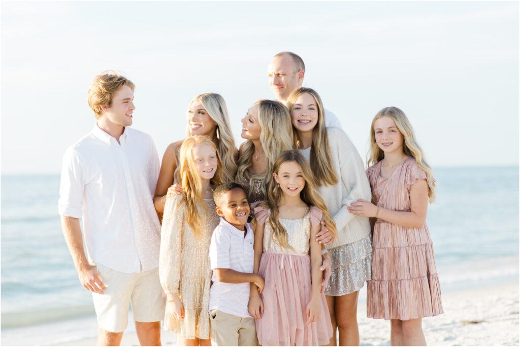 Clearwater beach family photoshoot. pastel beach photoshoot color palette. pastel beach photoshoot outfit inspo. tampa family photographer. 