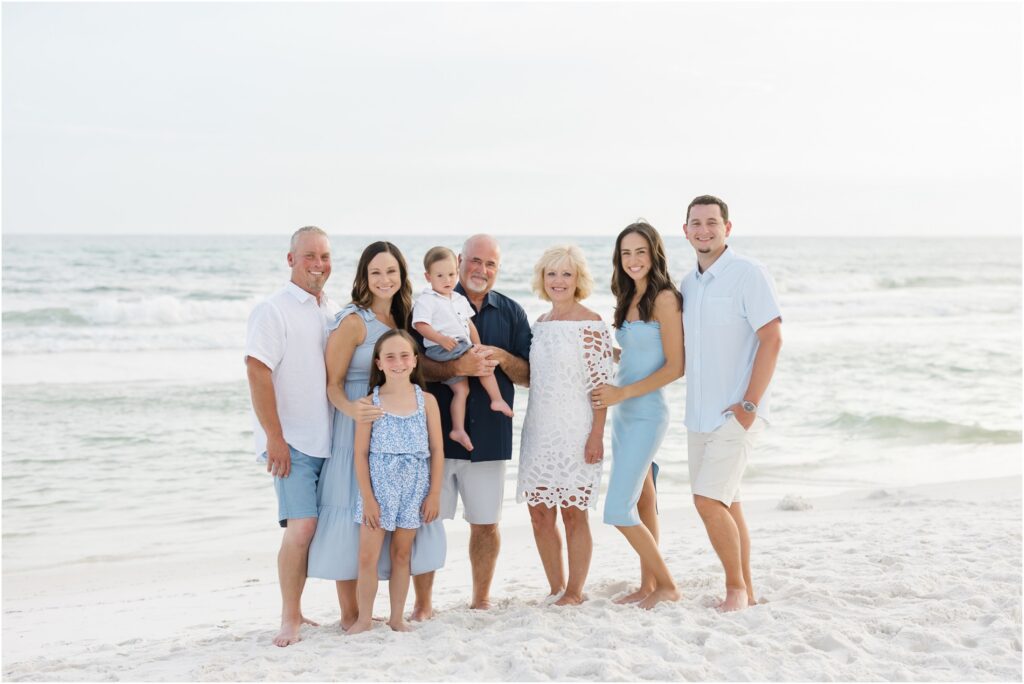 family photos in seaside florida. 30a florida beach photography. family beach photos in blue and white outfits. 