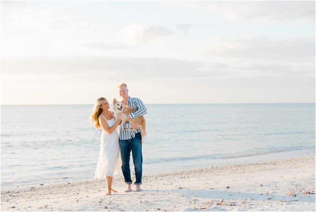 St Pete Beach Engagement Photoshoot. Pass A Grille Beach Engagment photoshoot. Engagment photos on beach with dog. tampa wedding photographer. 